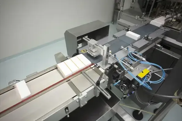 An automated assembly and packaging line in operation